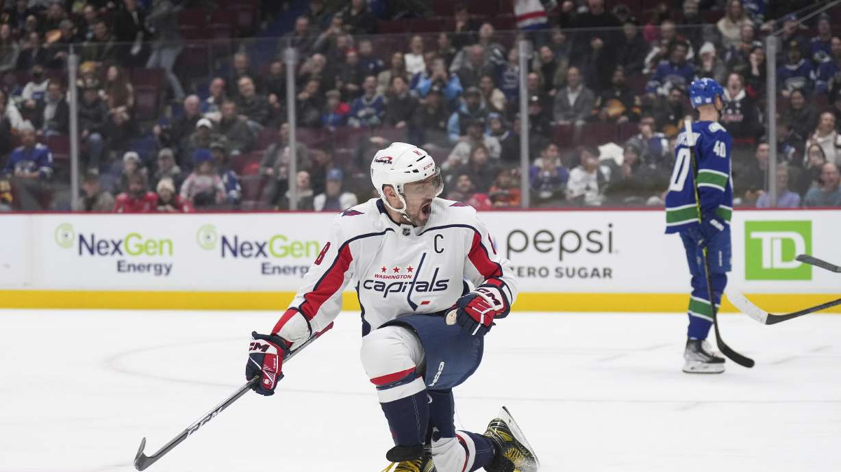 Washington Capitals' Alex Ovechkin celebrates a goal against the Vancouver Canucks during the first period of an NHL hockey game Tuesday, Nov. 29, 2022, in Vancouver, British Columbia.