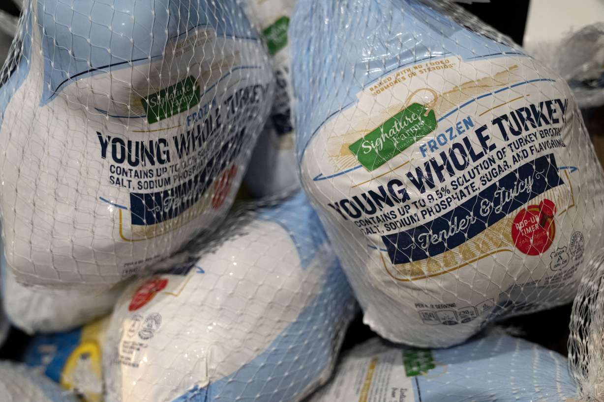 Bags of turkey await an annual Thanksgiving food giveaway at The Redeemed Christian Church of God New Wine Assembly, Nov. 22, in Washington.