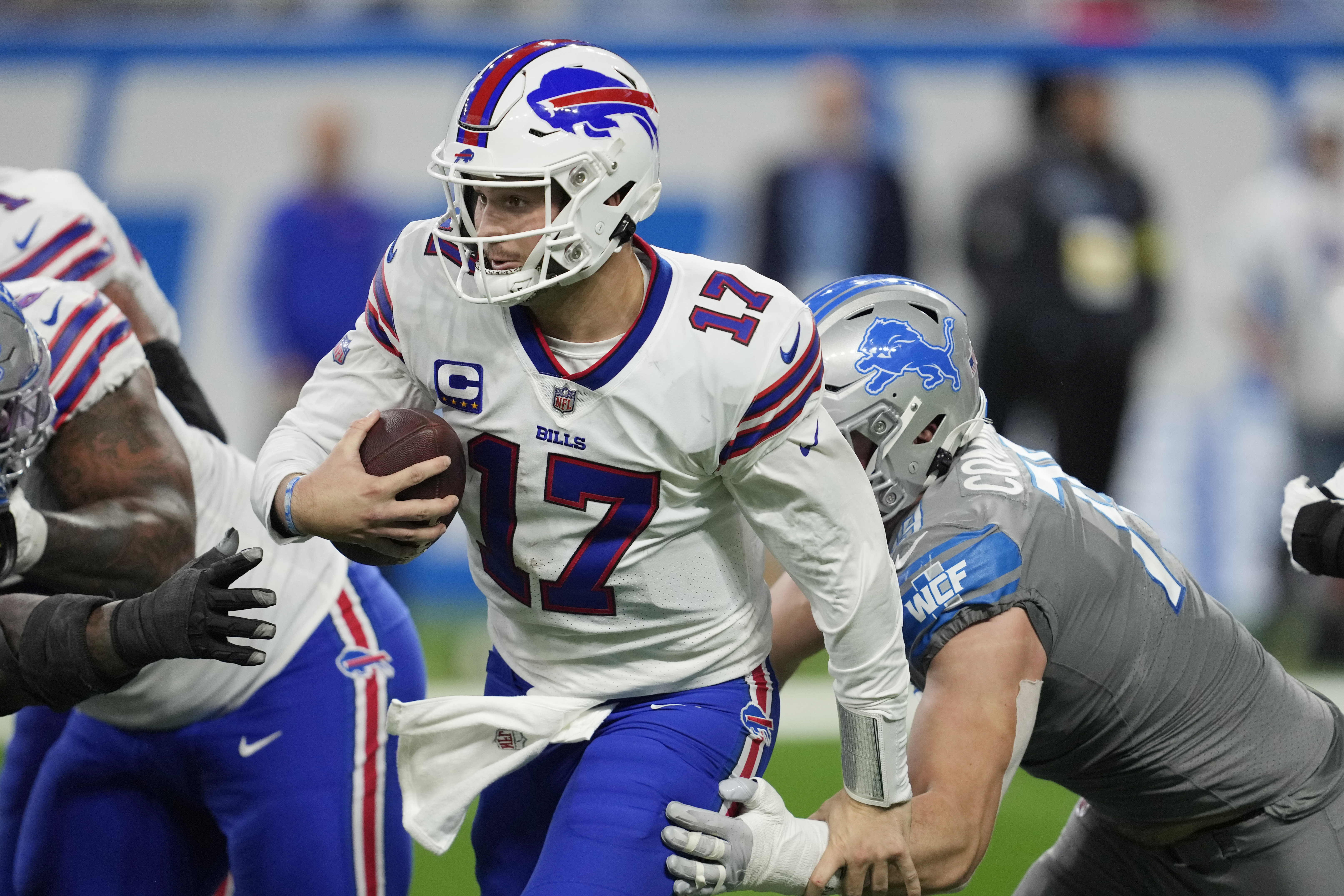 Buffalo Bills quarterback Josh Allen scrambles during the second half of an NFL football game against the Detroit Lions, Thursday, Nov. 24, 2022, in Detroit. 