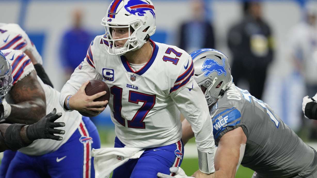 Buffalo Bills quarterback Josh Allen scrambles during the second half of an NFL football game against the Detroit Lions, Thursday, Nov. 24, 2022, in Detroit.