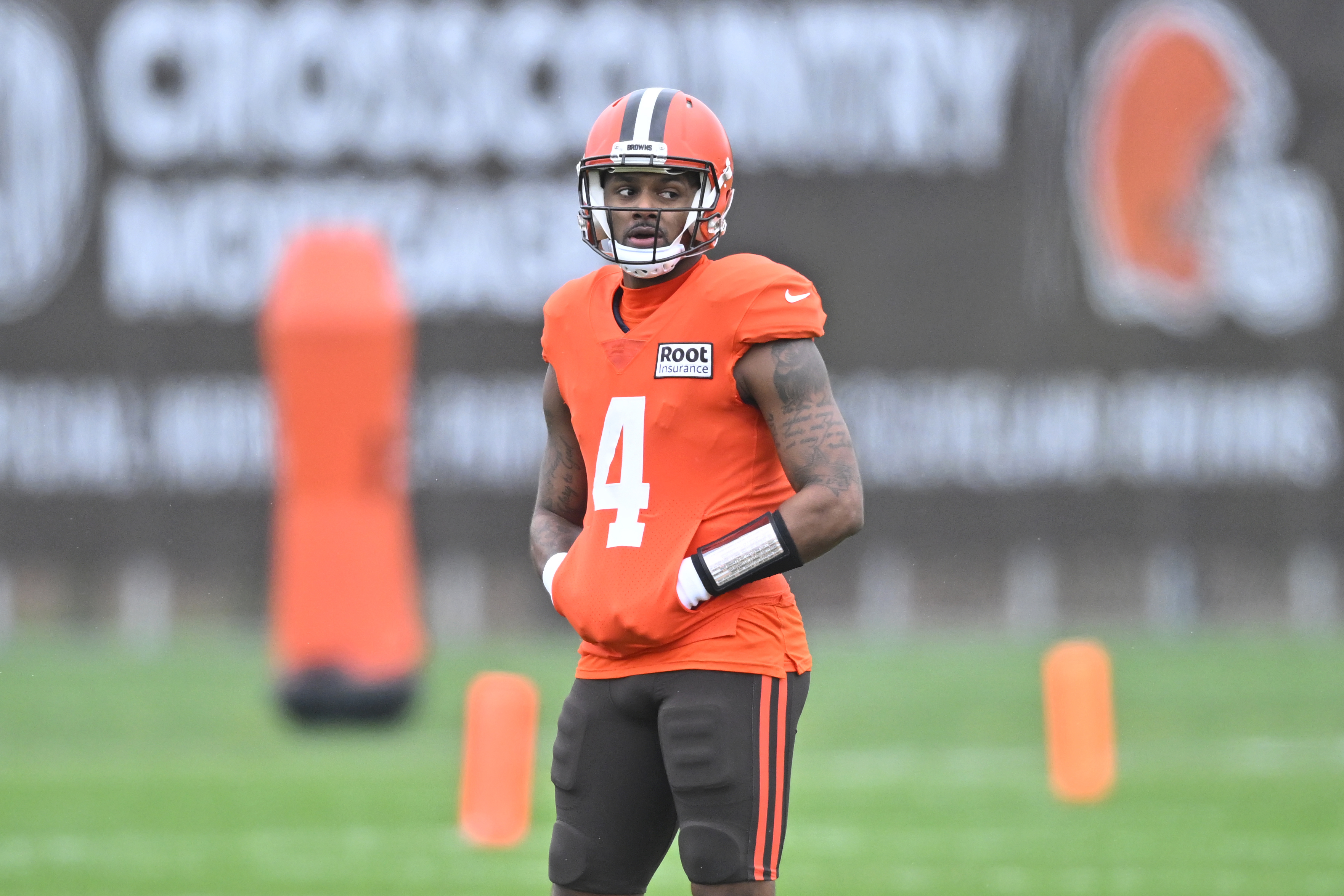 Cleveland Browns quarterback Deshaun Watson stands on the field during an NFL football practice at the team's training facility Wednesday, Nov. 16, 2022, in Berea, Ohio. 
