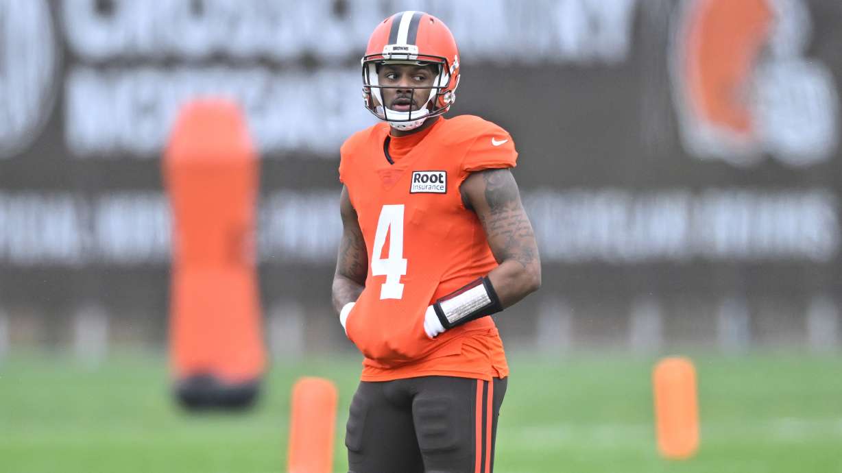 Cleveland Browns quarterback Deshaun Watson stands on the field during an NFL football practice at the team's training facility Wednesday, Nov. 16, 2022, in Berea, Ohio.