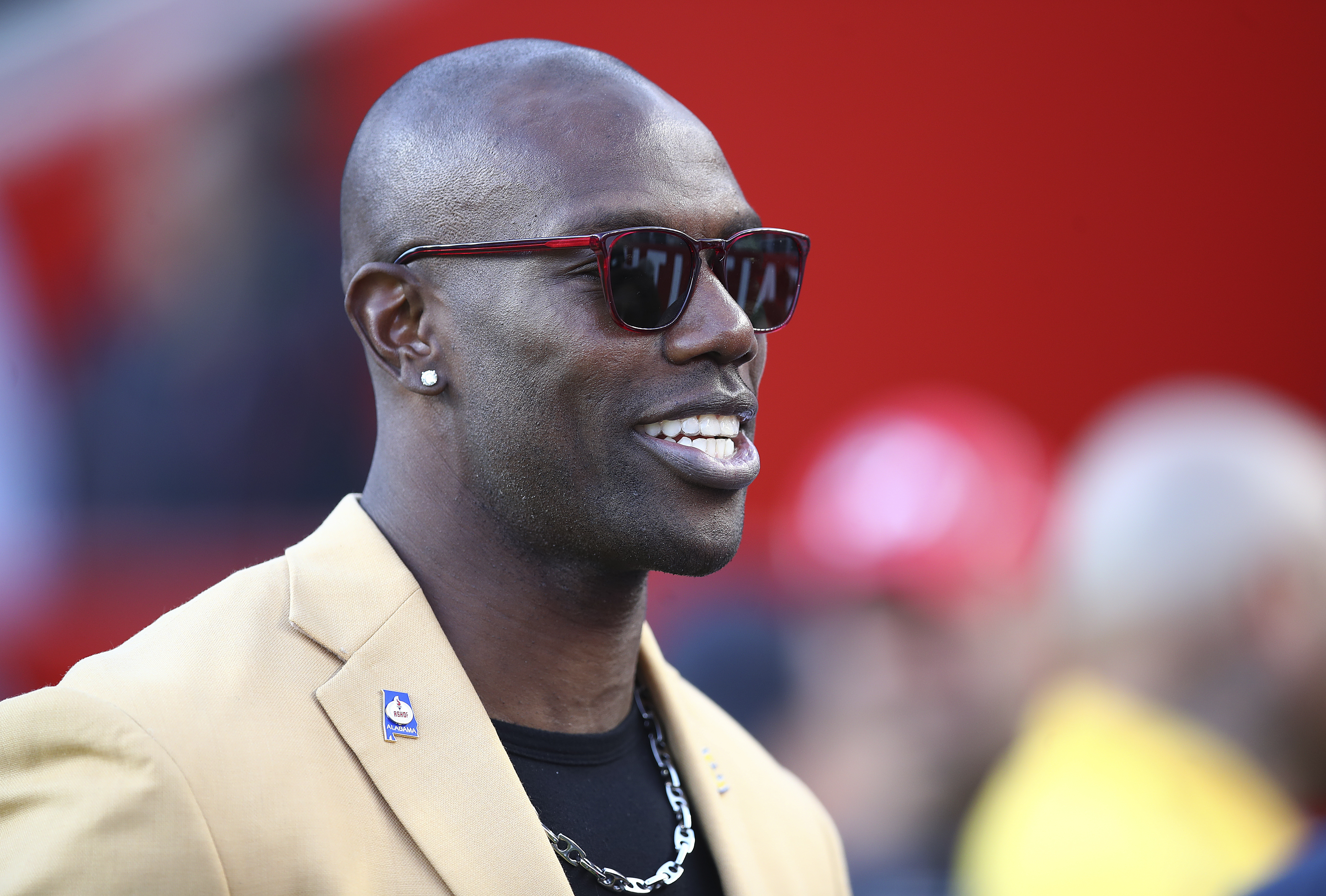 FILE - Former NFL wide receiver Terrell Owens is shown before an NFL football game between the San Francisco 49ers and the Oakland Raiders in Santa Clara, Calif., on Nov. 1, 2018. Owens said a fight caught on camera in which he punched a man in a CVS parking lot was the result of an “aggressor” threatening him and a fan he was talking to at the California store on Saturday, Nov. 26, 2022. 