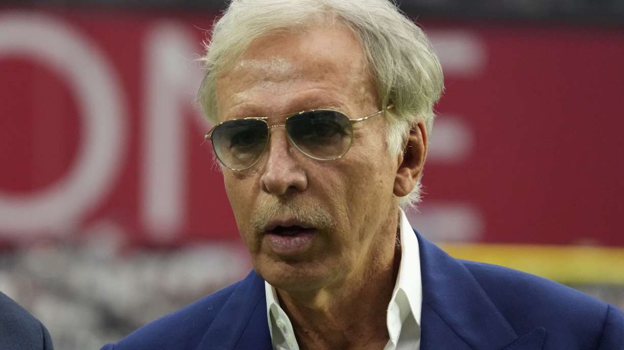 FILE - Los Angeles Rams owner Stan Kroenke is shown before an NFL football game between the Arizona Cardinals and the Los Angeles Rams, Sunday, Sept. 25, 2022, in Glendale, Ariz. Representatives of St. Louis, St. Louis County and the authority that owns The Dome at America’s Center have reached a tentative agreement dividing up the $519 million remaining in settlement money from the lawsuit over the NFL Rams’ relocation.