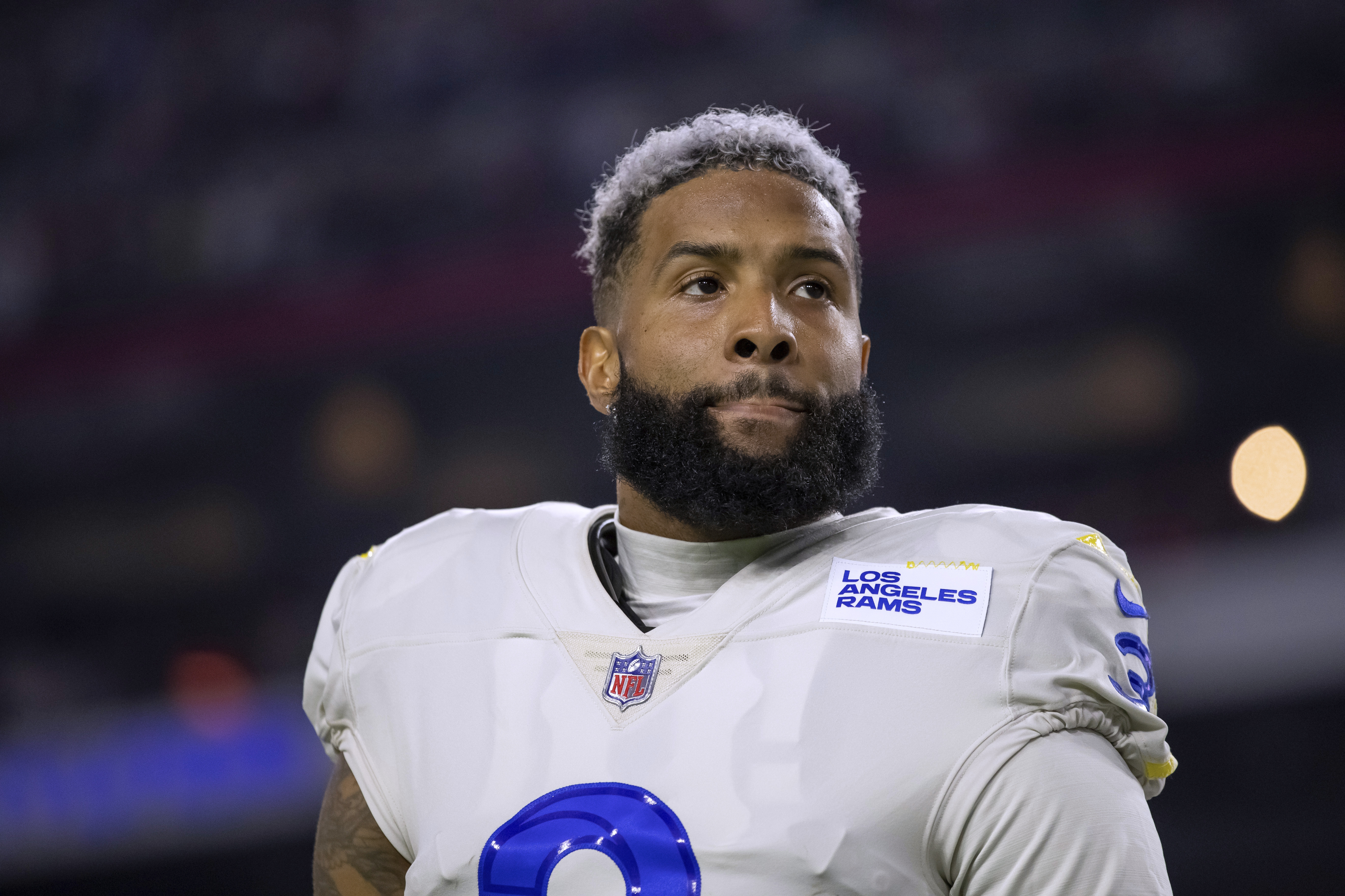 FILE - Los Angeles Rams wide receiver Odell Beckham Jr. stands for the national anthem before the team's NFL football game against the Arizona Cardinals on Dec. 13, 2021, in Glendale, Ariz. Beckham will kick off what is anticipated to be a three-city free agency tour when he meets Thursday, Dec. 1, with the New York Giants, the team that drafted him in 2014. Beckham is expected to talk with coach Brian Daboll and general manager Joe Schoen. Team surgeons also are expected to examine his left knee. 