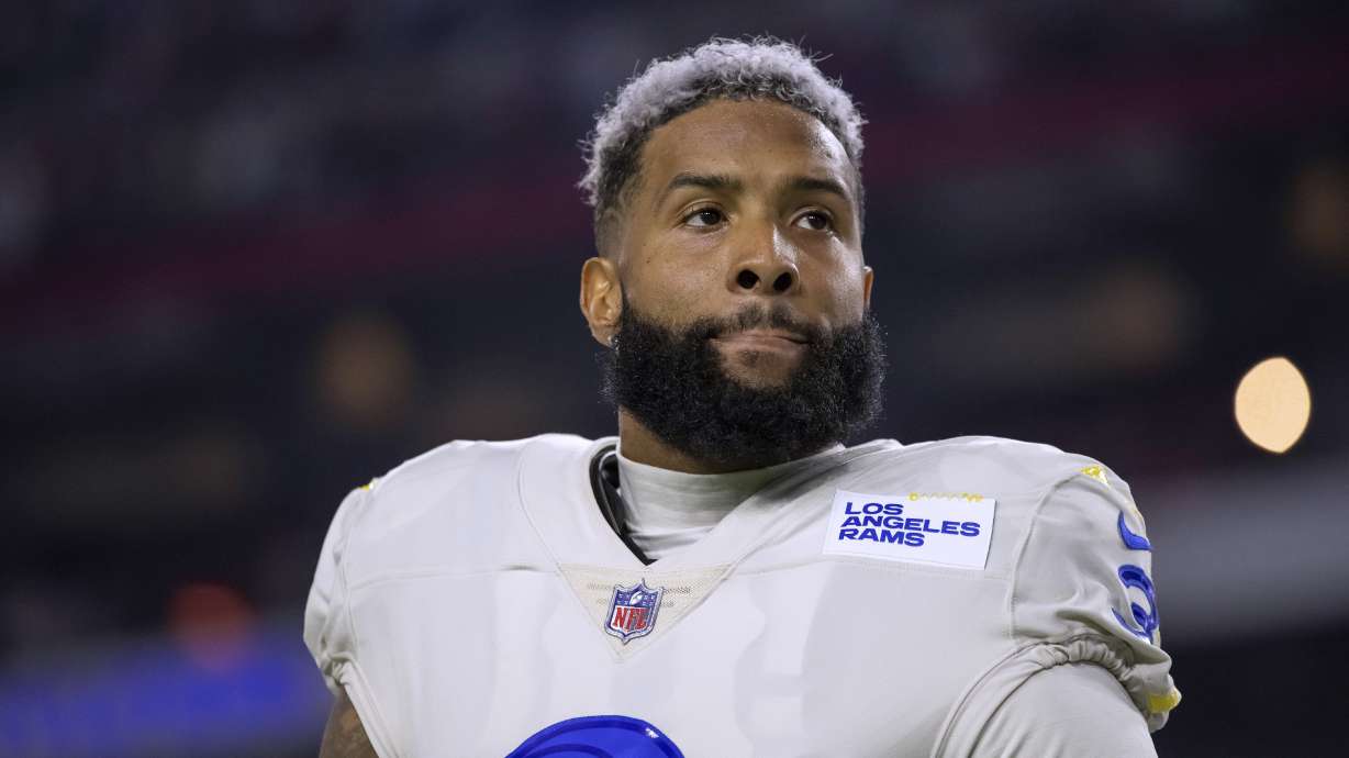 FILE - Los Angeles Rams wide receiver Odell Beckham Jr. stands for the national anthem before the team's NFL football game against the Arizona Cardinals on Dec. 13, 2021, in Glendale, Ariz. Beckham will kick off what is anticipated to be a three-city free agency tour when he meets Thursday, Dec. 1, with the New York Giants, the team that drafted him in 2014. Beckham is expected to talk with coach Brian Daboll and general manager Joe Schoen. Team surgeons also are expected to examine his left knee.