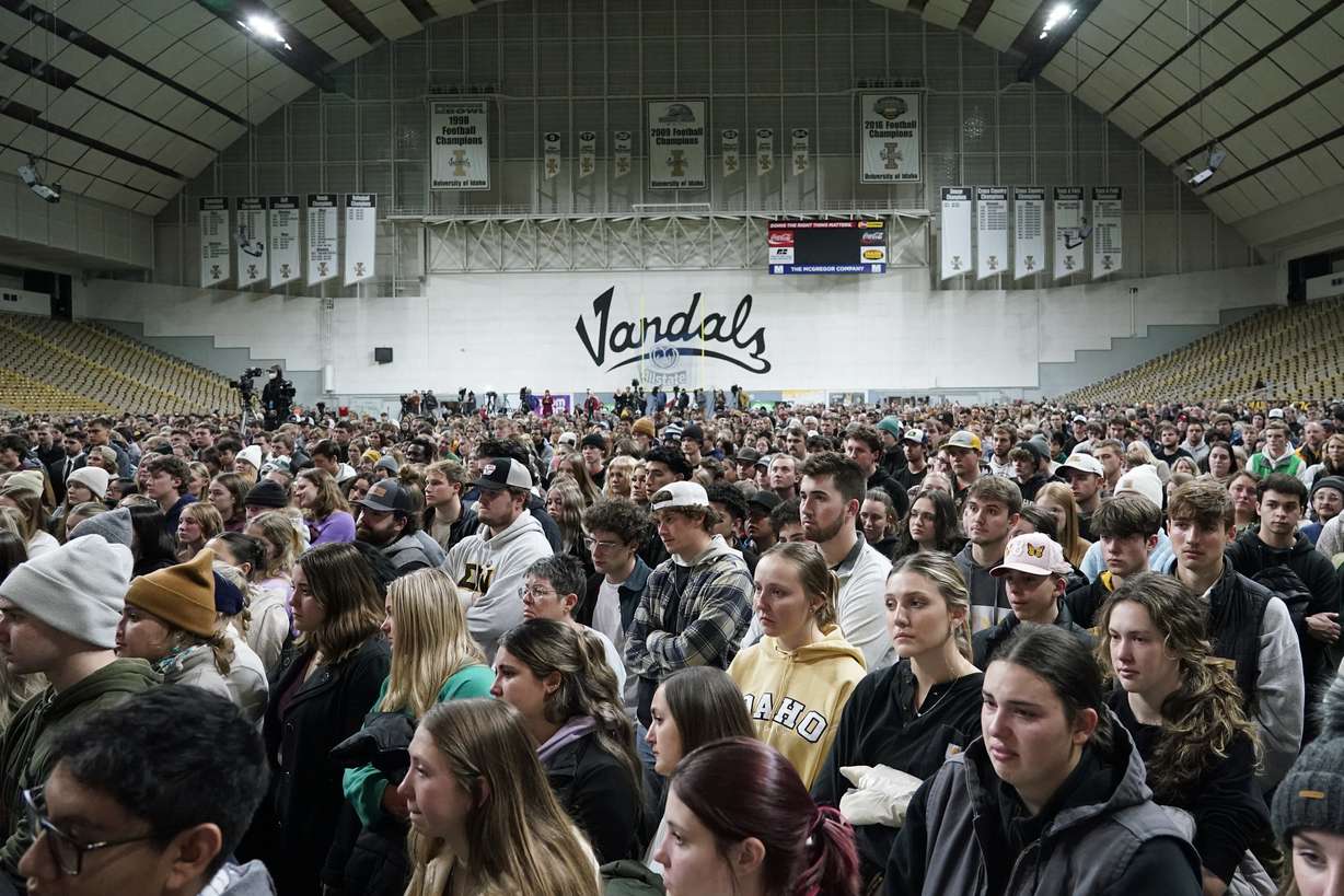 People attending a vigil for the four University of Idaho students who were killed on Nov. 13, stand in the Kibbie Dome as family members talk about their loved ones, Wednesday in Moscow, Idaho.