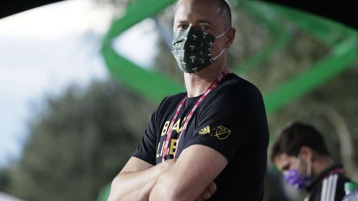 FILE - Portland Timbers team owner Merritt Paulson stands on the sidelines before the first half of an MLS soccer match against Orlando City, Tuesday, Aug. 11, 2020, in Kissimmee, Fla. Merritt Paulson, also the owner of the Portland Thorns, announced Thursday, Dec. 1, 2022, he is putting the club up for sale, the latest fallout from an investigation into misconduct in the National Women’s Soccer League.