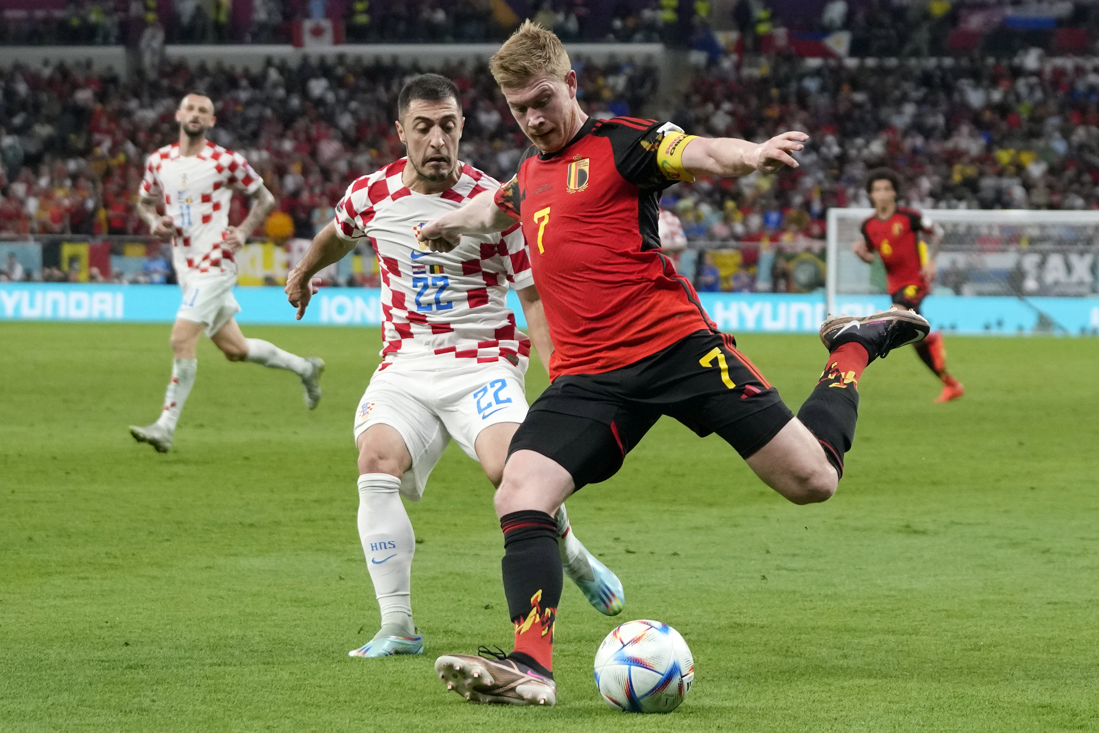 Belgium's Kevin De Bruyne, right, and Croatia's Josip Juranovic, left, fight for the ball during the World Cup group F soccer match between Croatia and Belgium at the Ahmad Bin Ali Stadium in Al Rayyan , Qatar, Thursday, Dec. 1, 2022. 