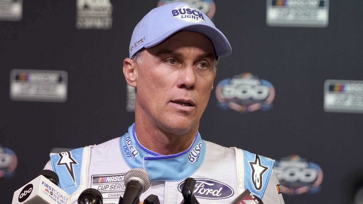 FILE - Kevin Harvick speaks during NASCAR Daytona 500 auto racing media day at Daytona International Speedway, Wednesday, Feb. 16, 2022, in Daytona Beach, Fla. Harvick will know if 2023 will be his final NASCAR season before he goes too Daytona in February. “I don't really have a clear answer on that right now,” the 2014 Cup champ said about his future Thursday, Dec. 1, before the NASCAR Awards.