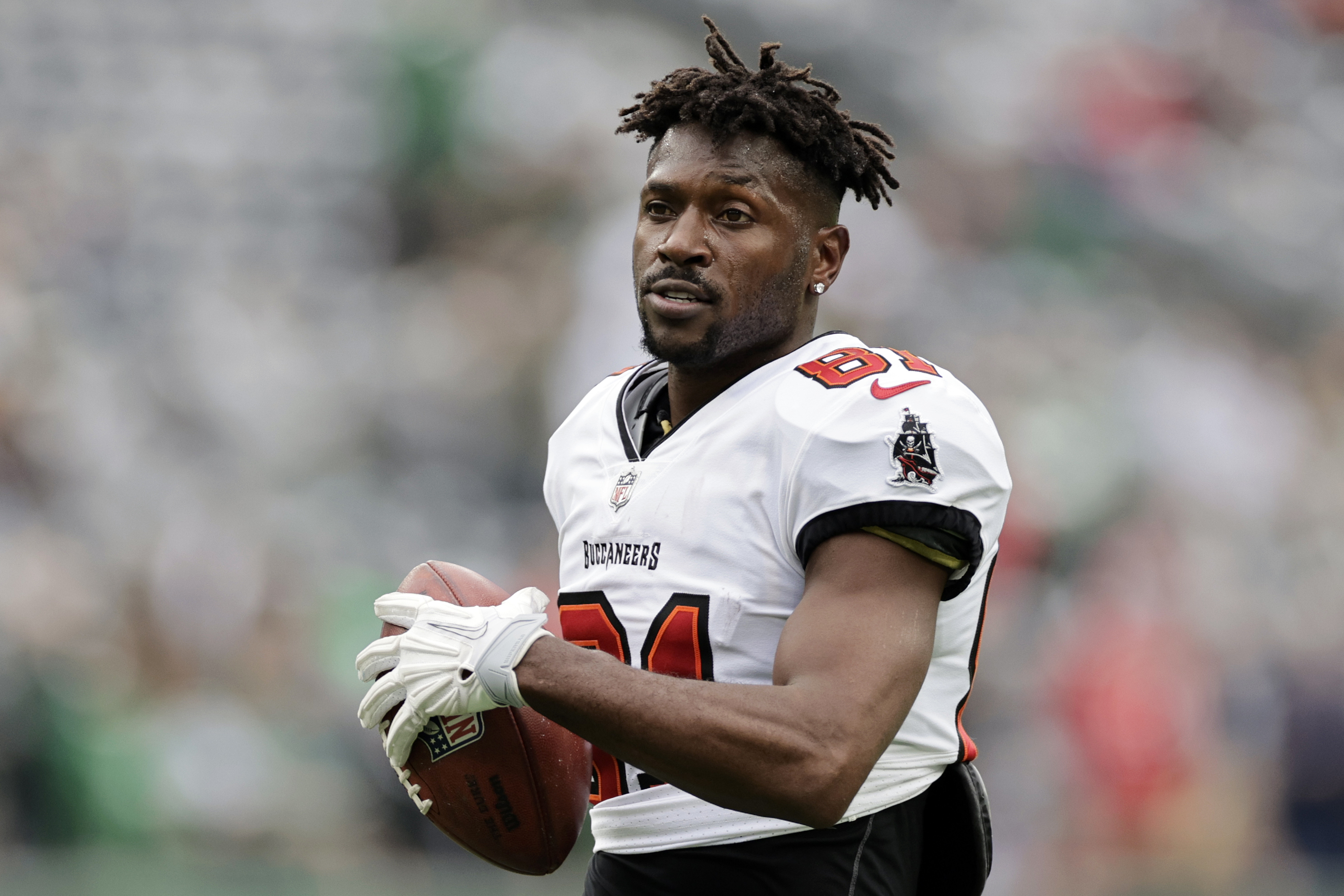 FILE - Tampa Bay Buccaneers wide receiver Antonio Brown (81) walks on the field during an NFL football game against the New York Jets, Sunday, Jan. 2, 2022, in East Rutherford, N.J. Former NFL wide receiver Antonio Brown is wanted on a battery charge stemming from a domestic incident, Tampa police said Thursday, Dec. 1, 2022.