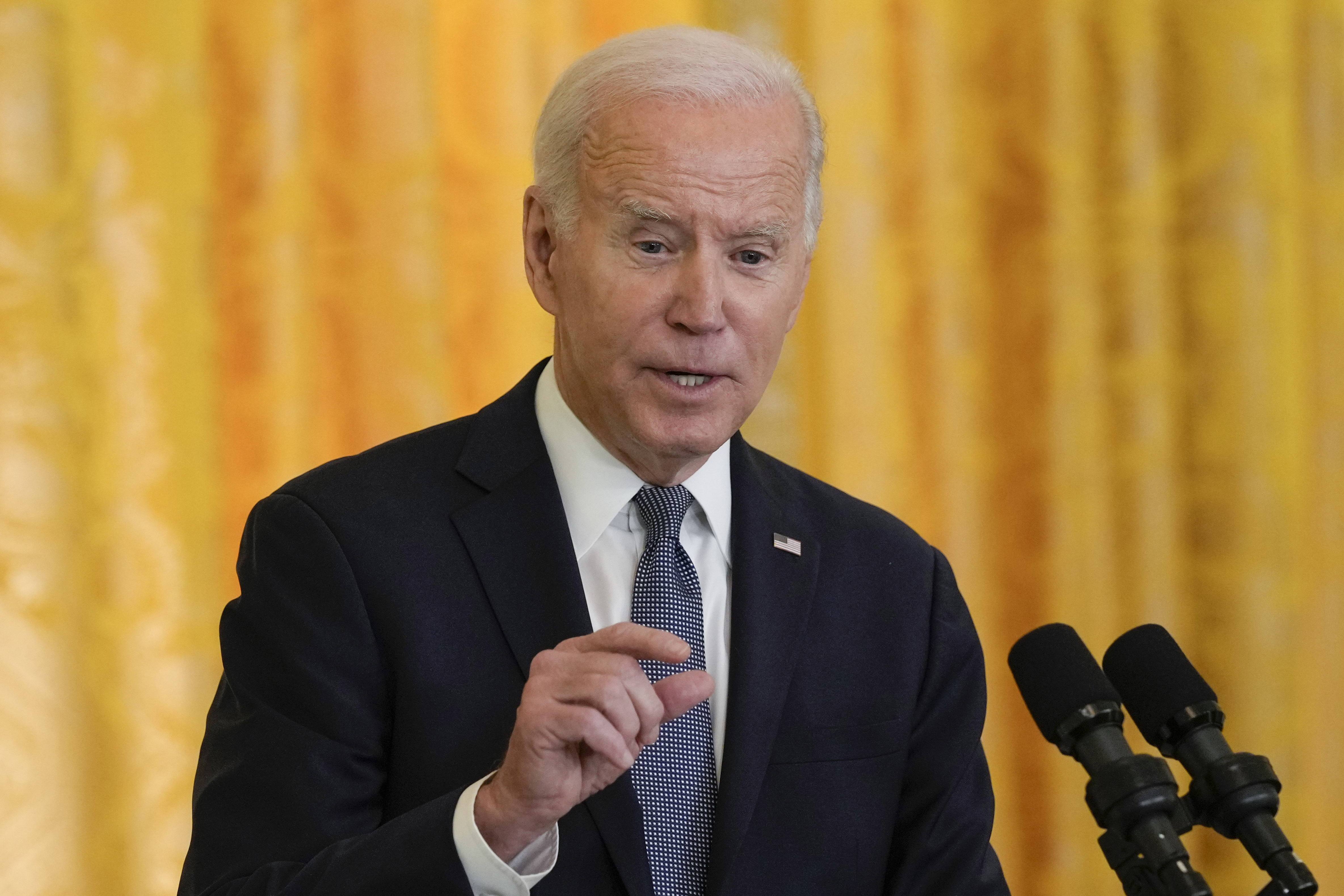 President Joe Biden speaks during a news conference with French President Emmanuel Macron in the East Room of the White House in Washington, Thursday. Biden says Democrats should give up "restrictive" caucuses and move to champion diversity in the order of their presidential primary calendar.