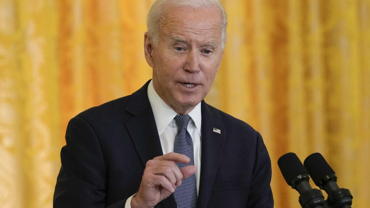 President Joe Biden speaks during a news conference with French President Emmanuel Macron in the East Room of the White House in Washington, Thursday. Biden says Democrats should give up "restrictive" caucuses and move to champion diversity in the order of their presidential primary calendar.