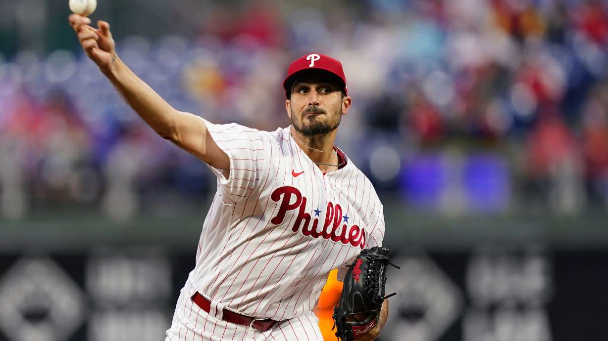 FILE - Philadelphia Phillies' Zach Eflin pitches during the first inning of the team's baseball game against the Colorado Rockies, April 26, 2022, in Philadelphia. Eflin has agreed to join the Tampa Bay Rays on a three-year, $40 million contract that’s the largest the club has ever awarded in free agency, a person familiar with the deal told The Associated Press.