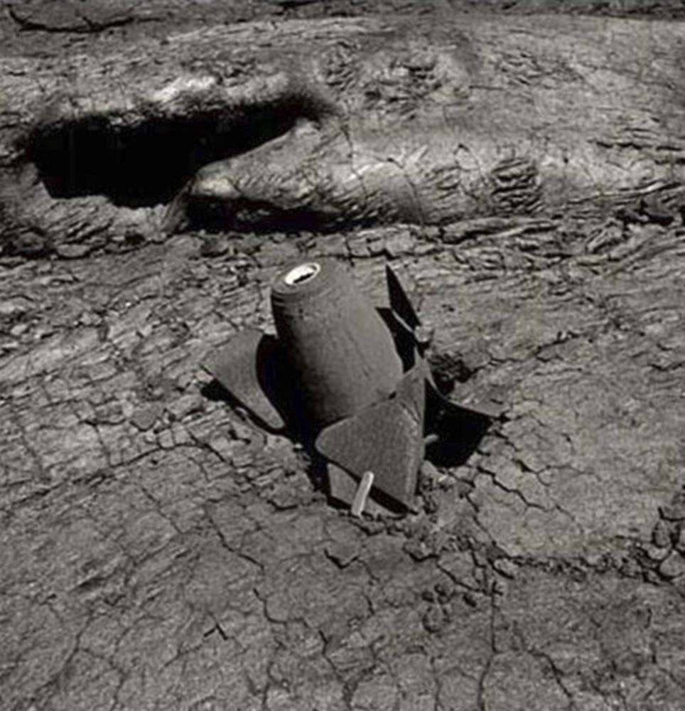 This photo provided by the United States Geological Survey shows one of the bombs dropped on the Mauna Loa 1935 flow. Now Mauna Loa — the world's largest active volcano — is erupting again, and lava is slowly approaching a major thoroughfare connecting the Big Island's east and west sides.