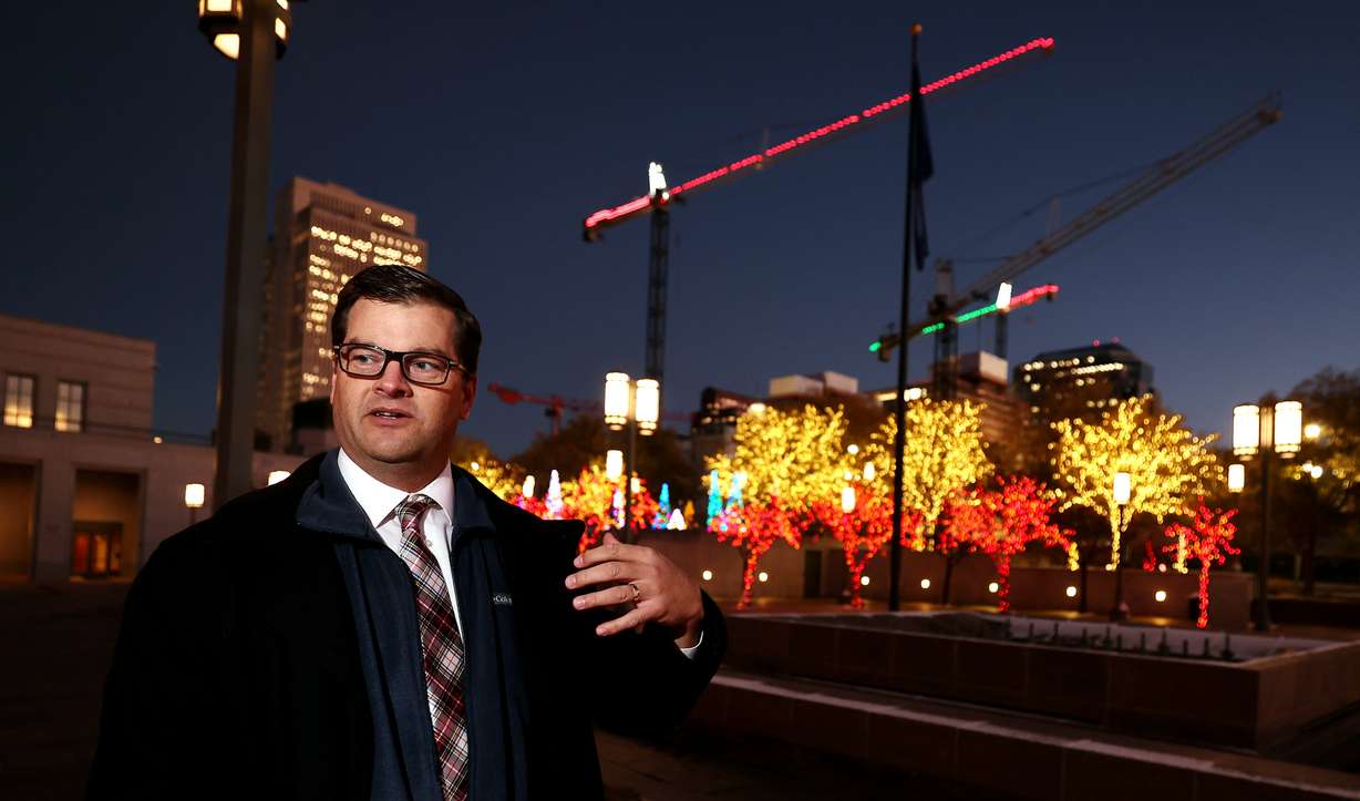 Jay Warnick, grounds manager at Temple Square, discusses the Christmas lights at the Conference Center in Salt Lake City on Tuesday, Nov. 29.