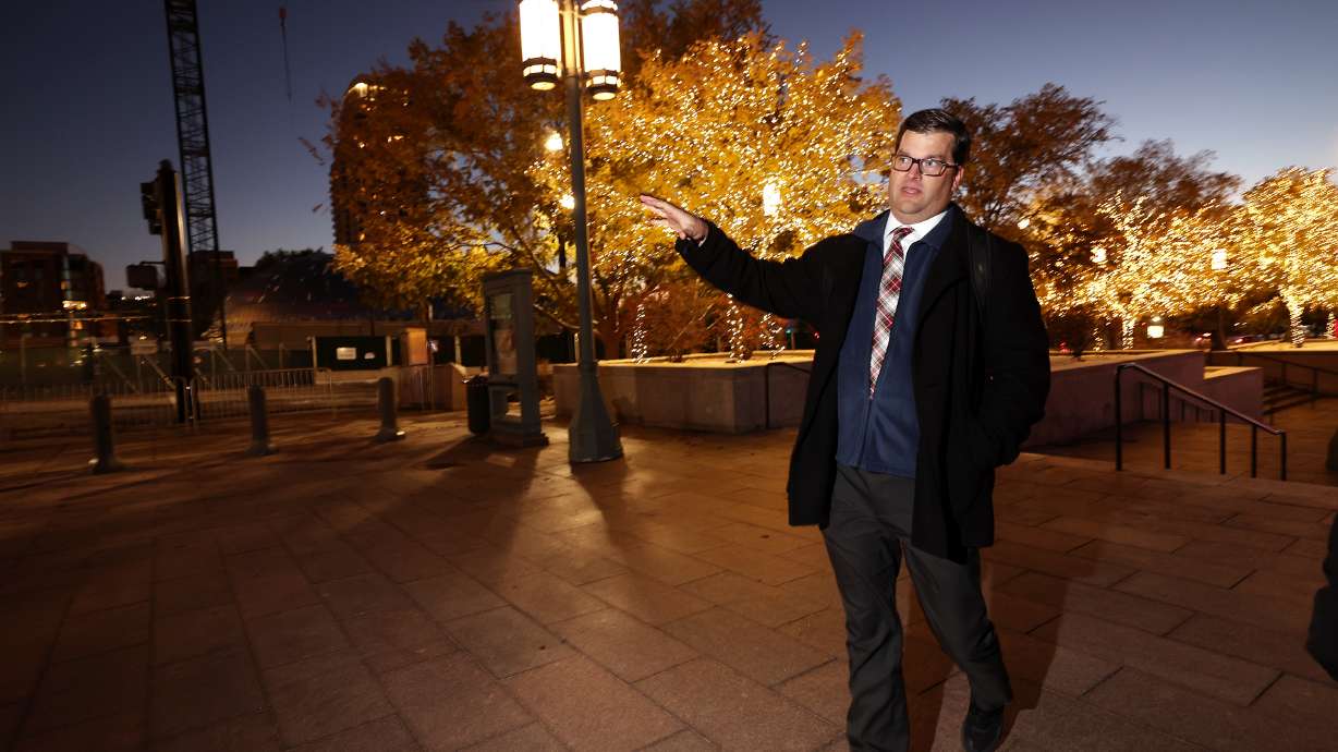 Jay Warnick, grounds manager at Temple Square, discusses the Christmas lights at the Conference Center in Salt Lake City on Nov. 29.