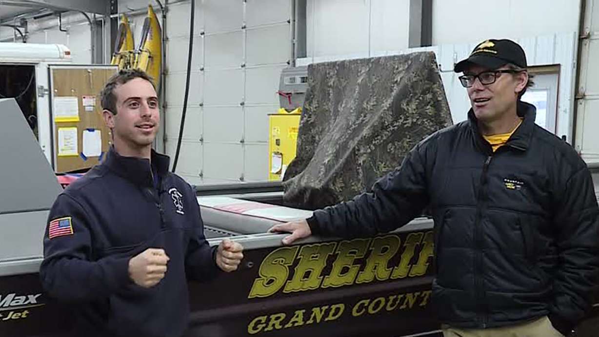 Grand County Search and Rescue technicians Brett Sherman, left, and Scott Solle talk to KSL Thursday, Dec. 1, 2022.