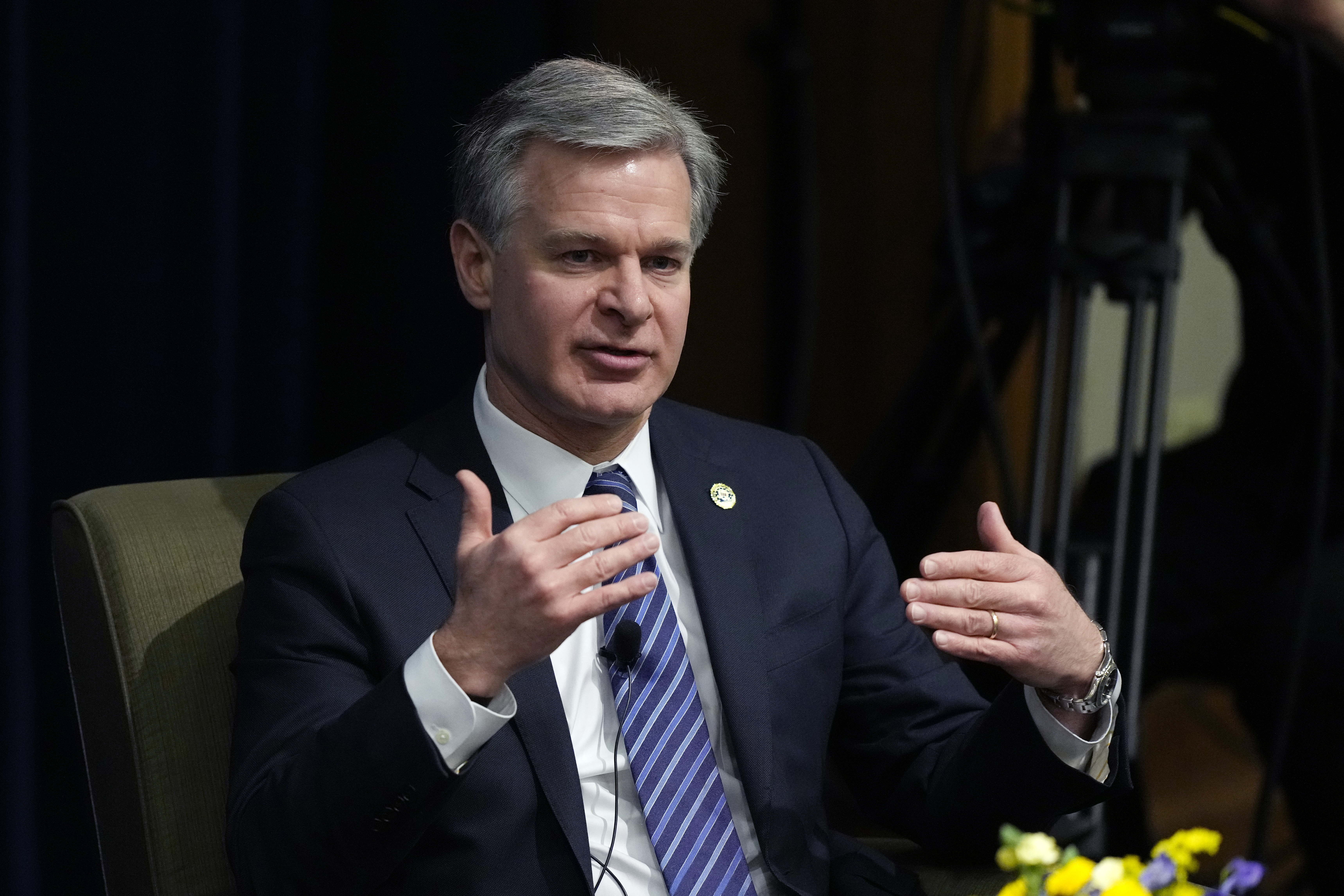 FBI Director Christopher Wray speaks at the Gerald R. Ford School of Public Policy at the University of Michigan, Friday, in Ann Arbor, Mich. Wray is raising national security concerns about TikTok, warning Friday that control of the popular video sharing app is in the hands of a Chinese government "that doesn't share our values." 