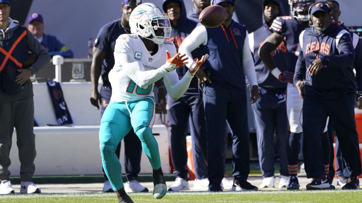 Miami Dolphins wide receiver Tyreek Hill catches a pass during the first half of an NFL football game against the Chicago Bears, Sunday, Nov. 6, 2022 in Chicago.