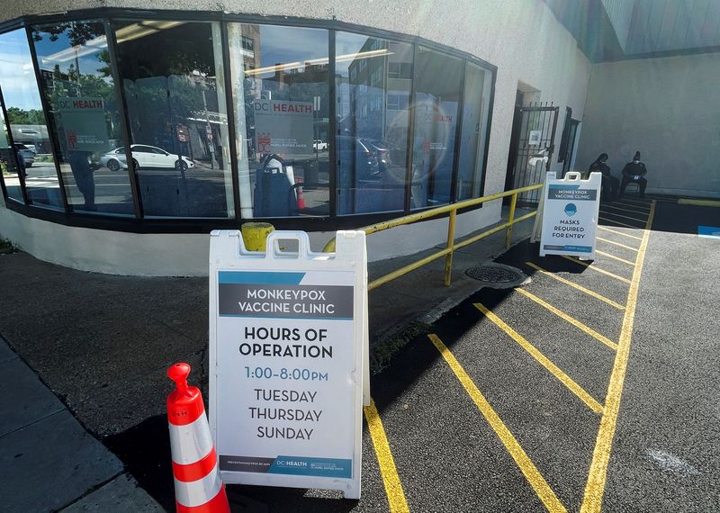 Workers sit outside of D.C. Health's first mpox, previously known as monkeypox, vaccination clinic, which is administering the first Jynneos vaccine doses distributed in the U.S. capital, in Washington, June 28. The disease is expected to no longer be considered a public health emergency in the United States from Feb. 1, 2023, the U.S. health department said on Friday.