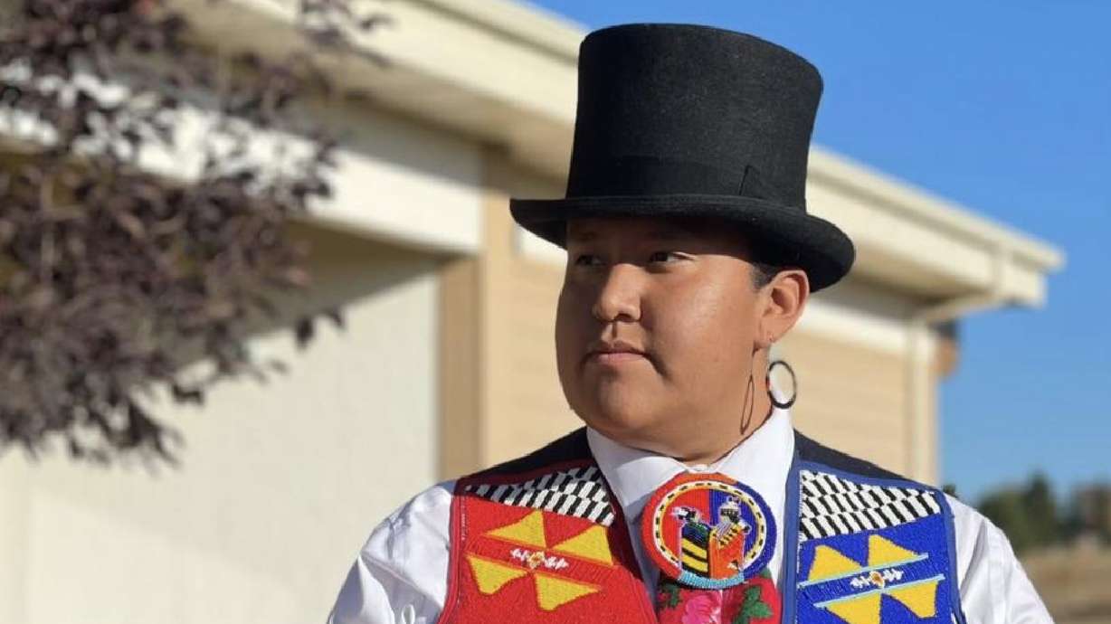 Taylor "Cheíí" Begay poses for a photo in his trademark top hat. Begay pulled inspiration from a number of Indigenous leaders to help develop his own brand.