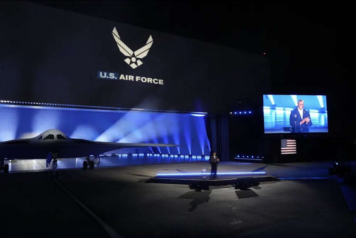 Secretary of Defense Lloyd Austin introduces the B-21 Raider stealth at Northrop Grumman Friday in Palmdale, Calif. America’s newest nuclear stealth bomber made its debut Friday after years of secret development and as part of the Pentagon’s answer to rising concerns over a future conflict with China.