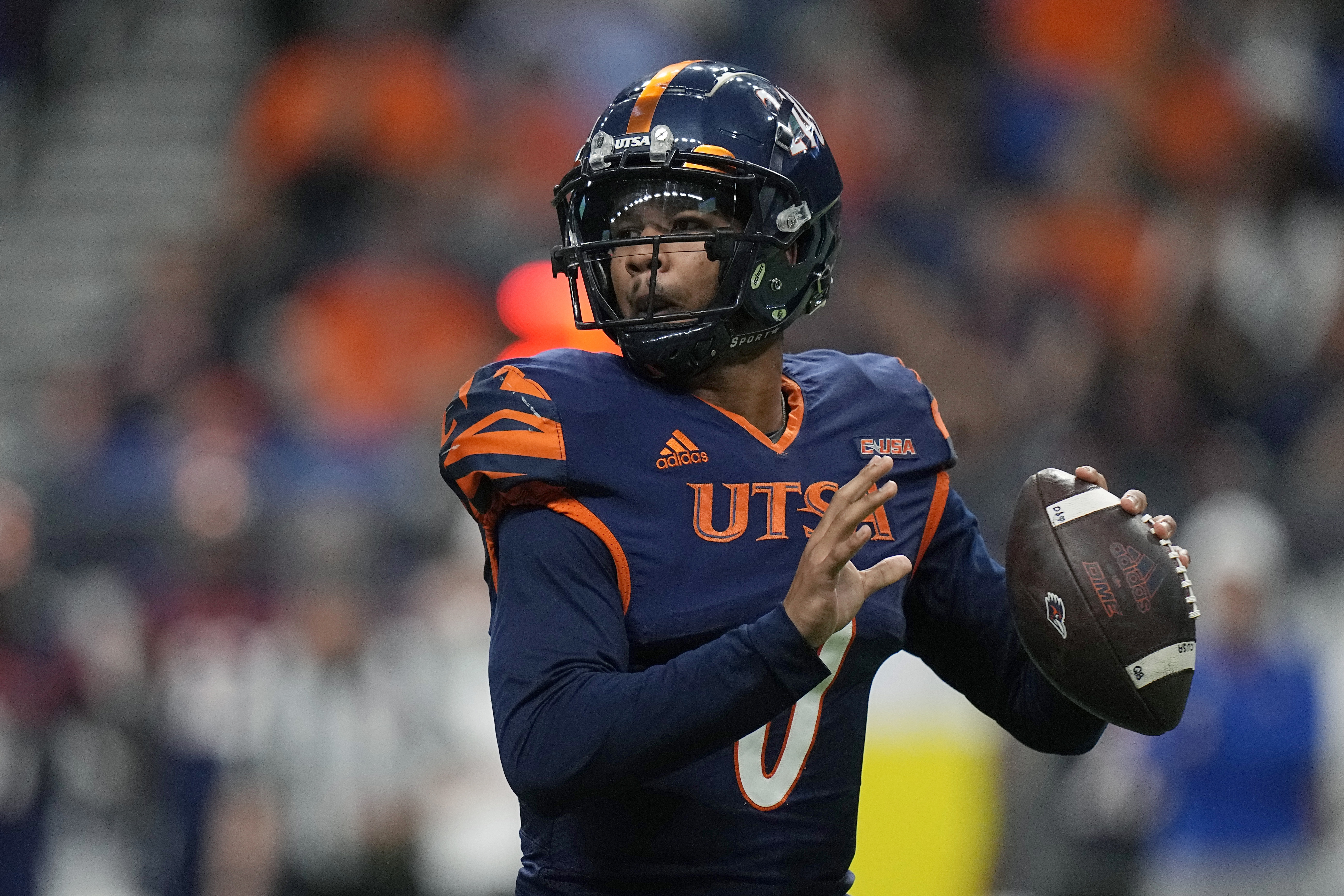 UTSA quarterback Frank Harris (0) looks to pass against North Texas during the first half of an NCAA college football game for the Conference USA championship in San Antonio, Friday, Dec. 2, 2022. 