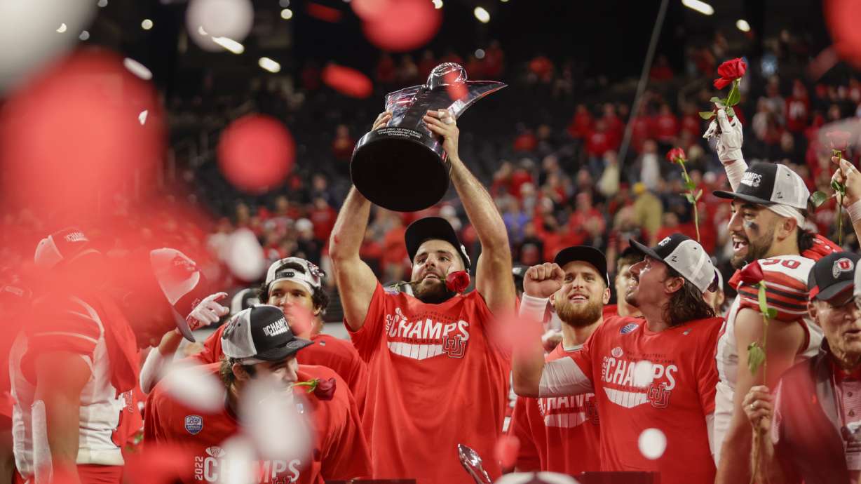 Utah Utes Thomas Yassmin celebrates winning the Pac-12 championship after beating the USC Trojans at the Allegiant Stadium in Las Vegas on Friday, Dec. 2, 2022. The Utes won 47-24.