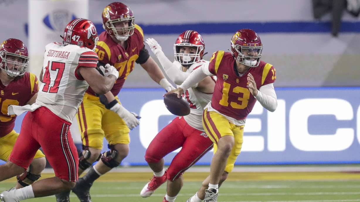 USC Trojans QB Caleb Williams runs with the ball while playing the Utah Utes during the Pac-12 Championship at the Allegiant Stadium in Las Vegas on Friday, Dec. 2, 2022. The Utes won 47-24.