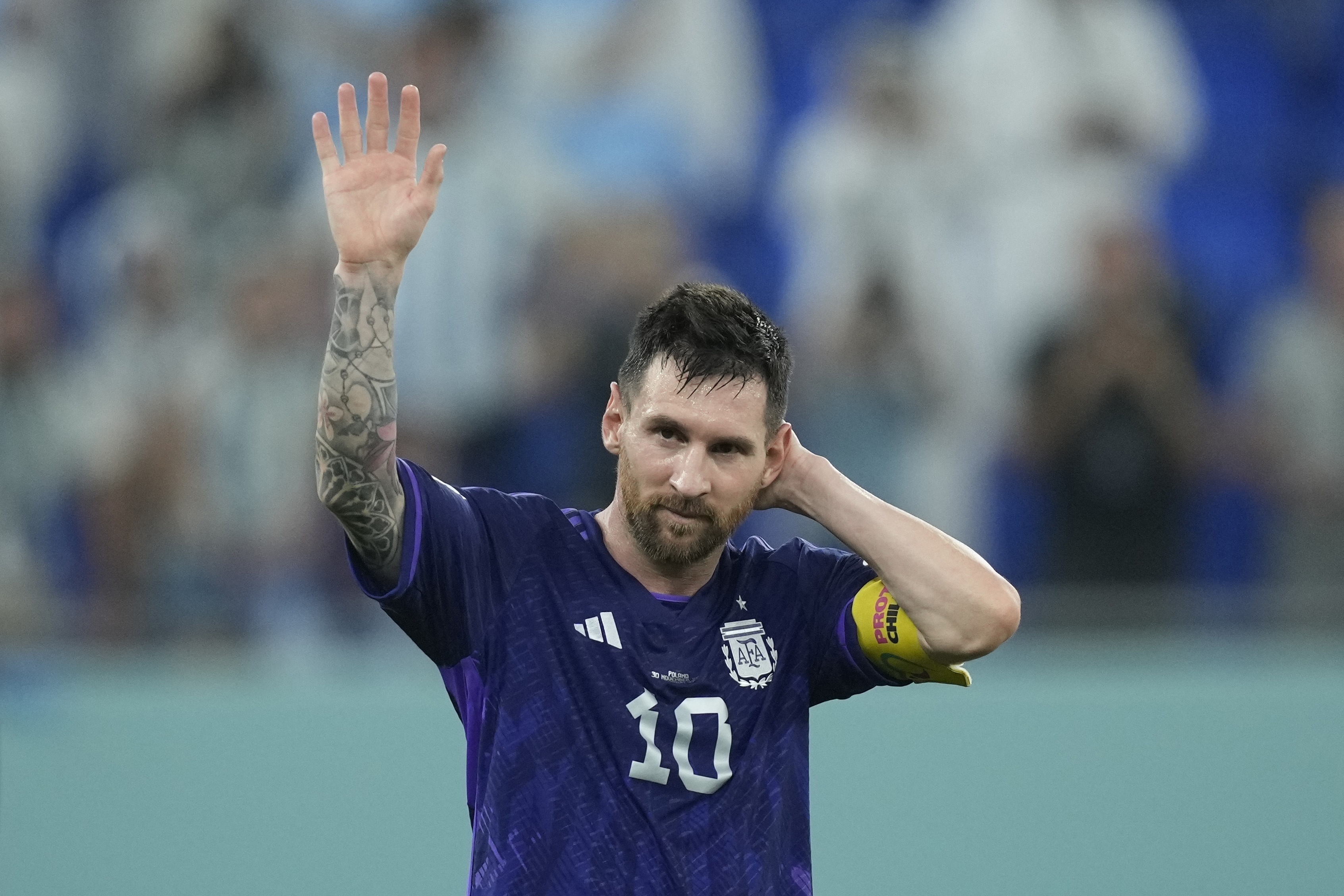 Argentina's Lionel Messi waves to the fans after the World Cup group C soccer match between Poland and Argentina at the Stadium 974 in Doha, Qatar, Wednesday, Nov. 30, 2022. Argentina won 2-0. 