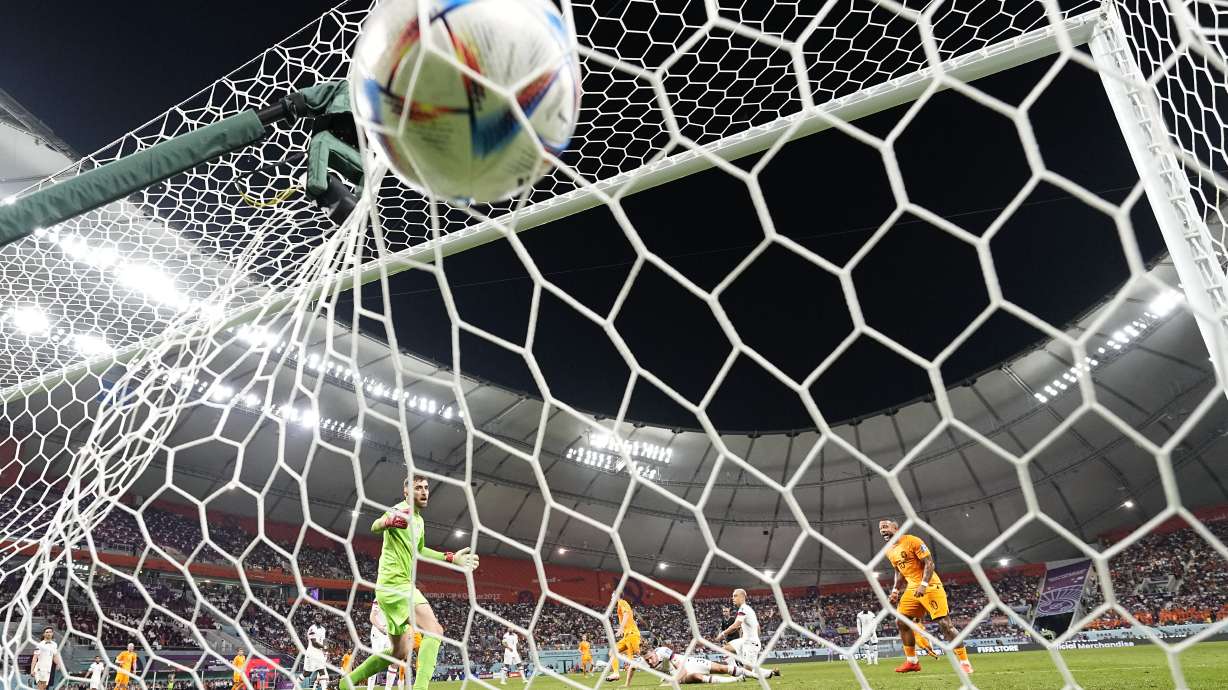 Daley Blind of the Netherlands scores his side's second goal during the World Cup round of 16 soccer match between the Netherlands and the United States, at the Khalifa International Stadium in Doha, Qatar, Saturday, Dec. 3, 2022.