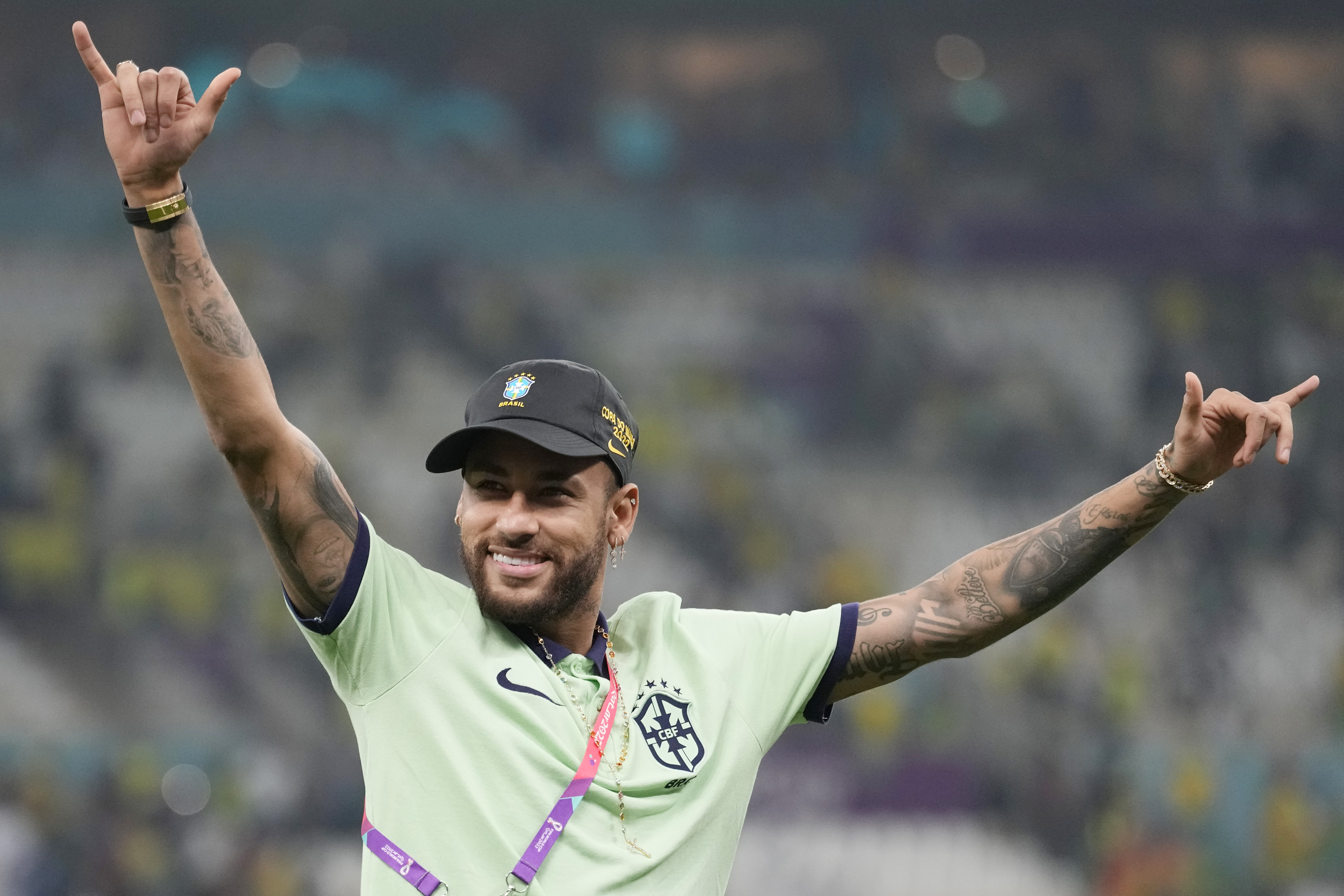 Brazil's Neymar greets the supporters after the World Cup group G soccer match between Cameroon and Brazil, at the Lusail Stadium in Lusail, Qatar, Saturday, Dec. 3, 2022. 