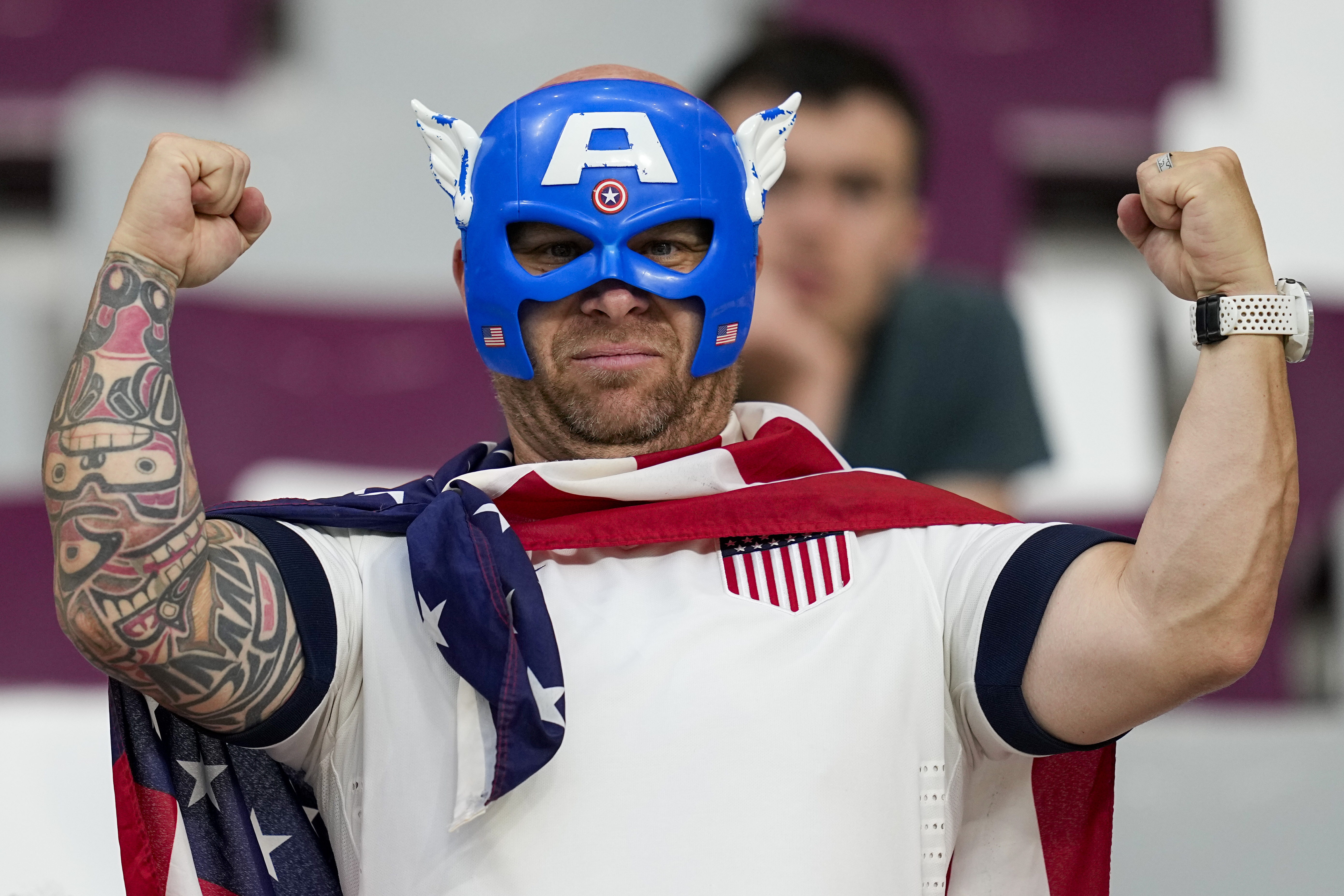 A a fan waits for the start of the World Cup round of 16 soccer match between the Netherlands and the United States, at the Khalifa International Stadium in Doha, Qatar, Saturday, Dec. 3, 2022.