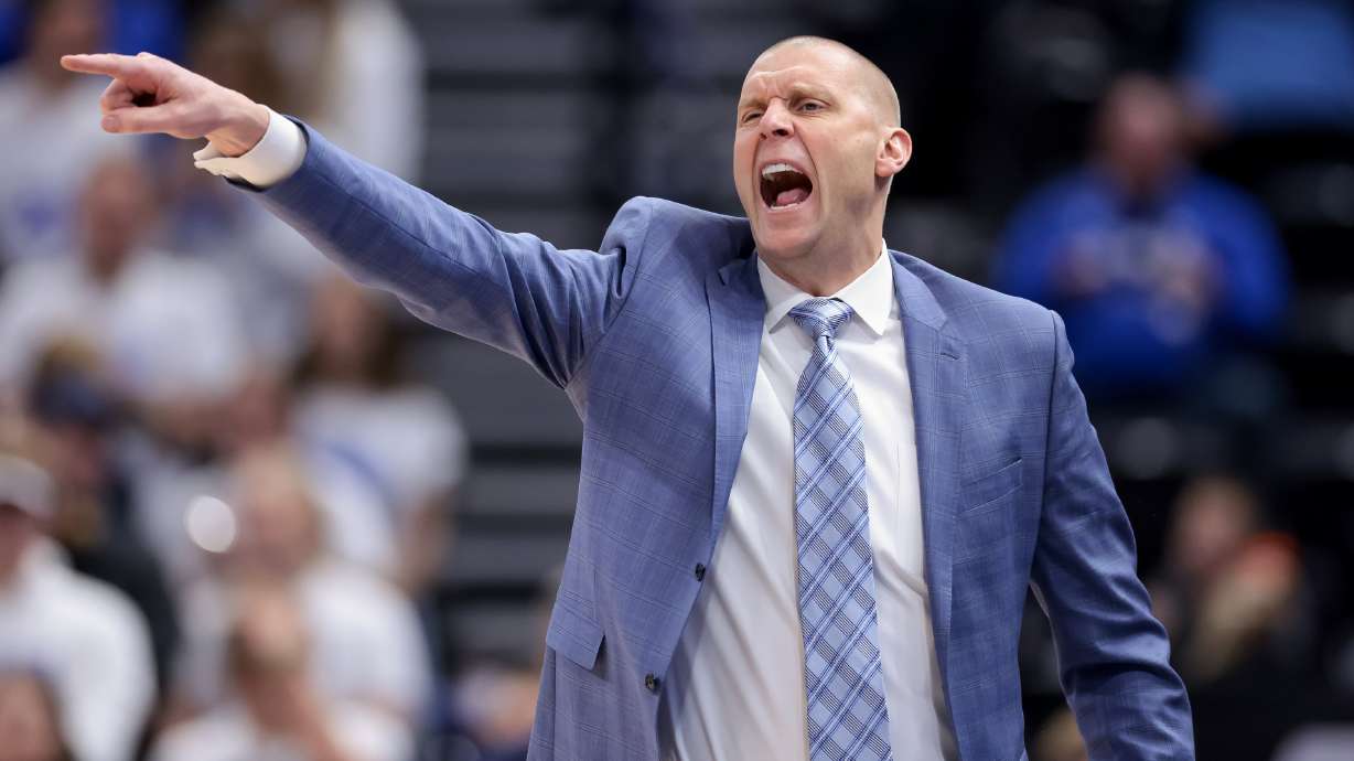 BYU Cougars head coach Mark Pope calls out from the bench during the game against the South Dakota Coyotes at Vivint Arena in Salt Lake City on Saturday, Dec. 3, 2022.