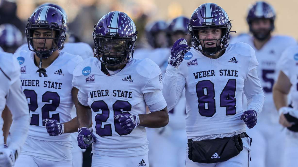 Weber State players get ready for their second round playoff game against Montana State on Dec. 3, 2022.