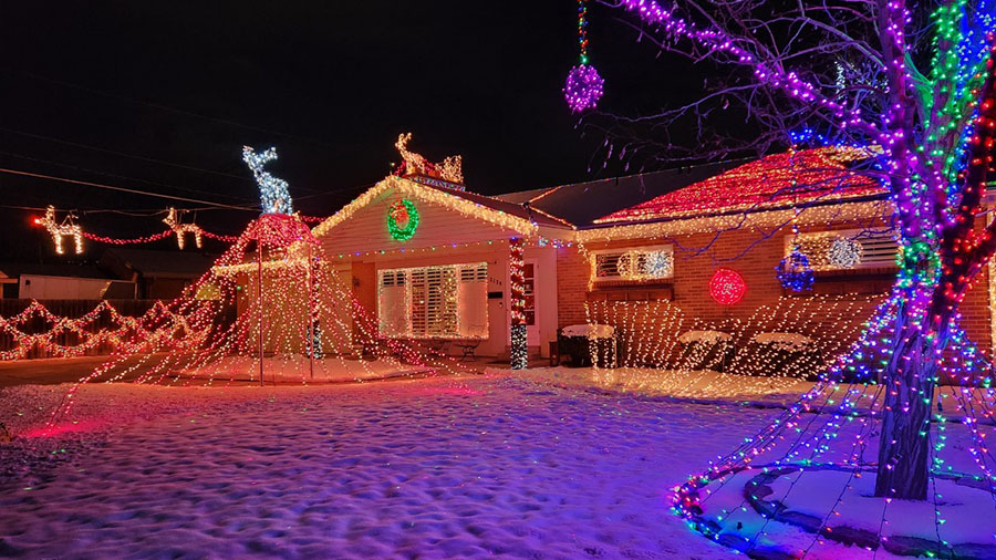 Millcreek man lights up neighborhood with the face of Santa