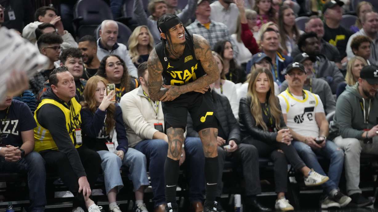 Utah Jazz guard Jordan Clarkson (00) reacts after a big hit during the second half of an NBA basketball game against the Portland Trail Blazers Saturday, Dec. 3, 2022, in Salt Lake City.