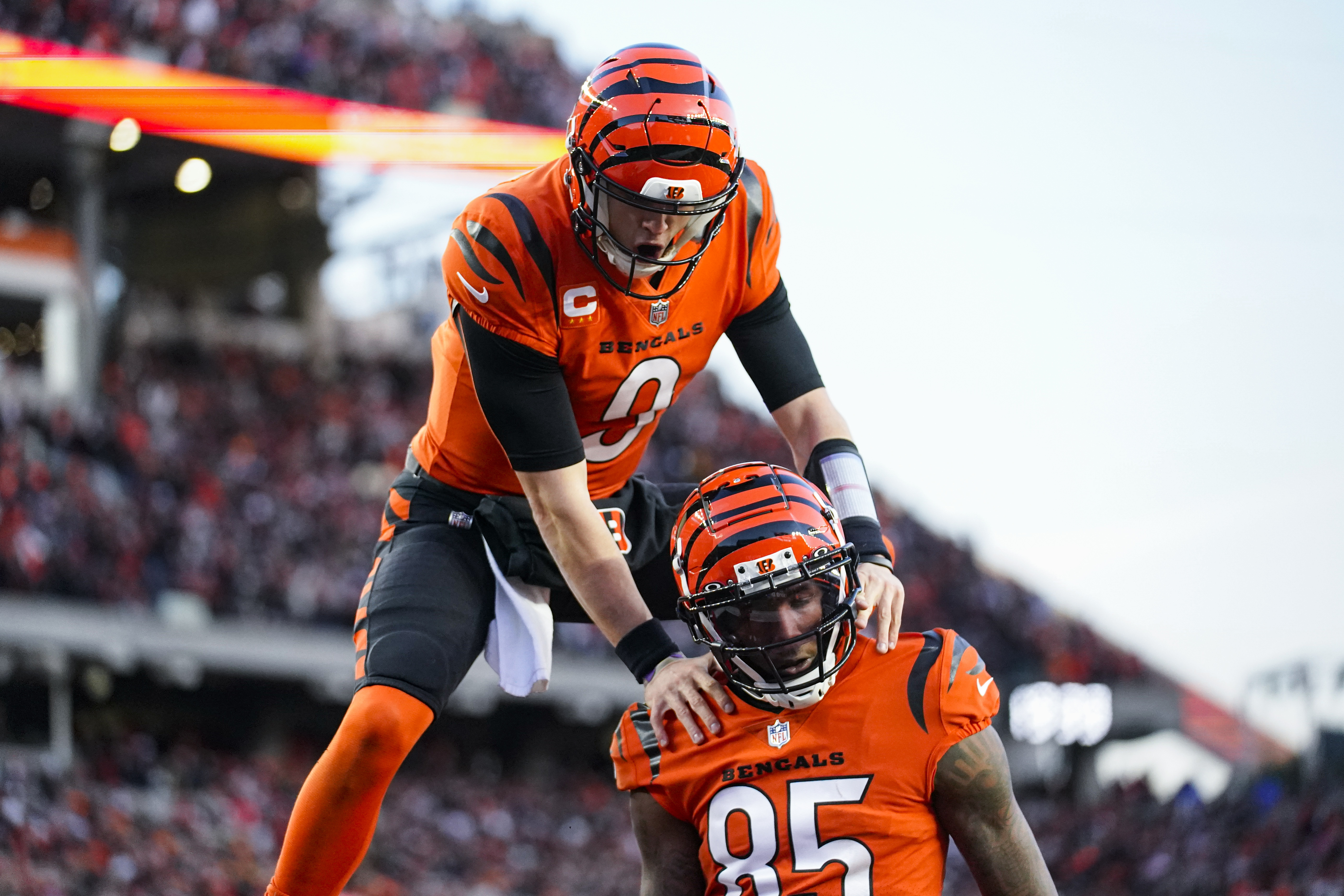 Cincinnati Bengals wide receiver Tee Higgins (85) and quarterback Joe Burrow (9) celebrate a touchdown against the Kansas City Chiefs in the first half of an NFL football game in Cincinnati, Sunday, Dec. 4, 2022. 