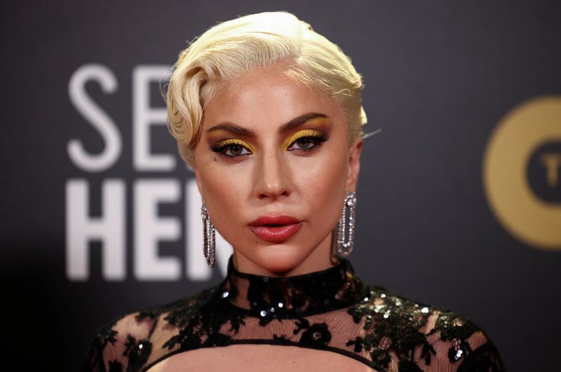 Lady Gaga attends the 27th annual Critics Choice Awards at the Savoy Hotel in London on March 13. The man who shot and wounded Lady Gaga's dog walker during the theft of two of the singer's French bulldogs in Hollywood last year pleaded no contest to attempted murder on Monday and was immediately sentenced to 21 years in prison.