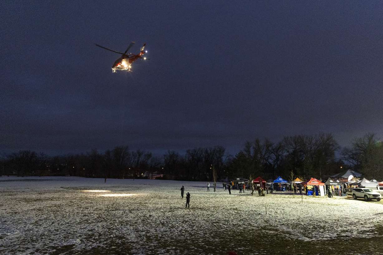 A medical helicopter lands at an event kicking off the fourth annual Avalanche Awareness Week, at Sugar House Park on Monday.
