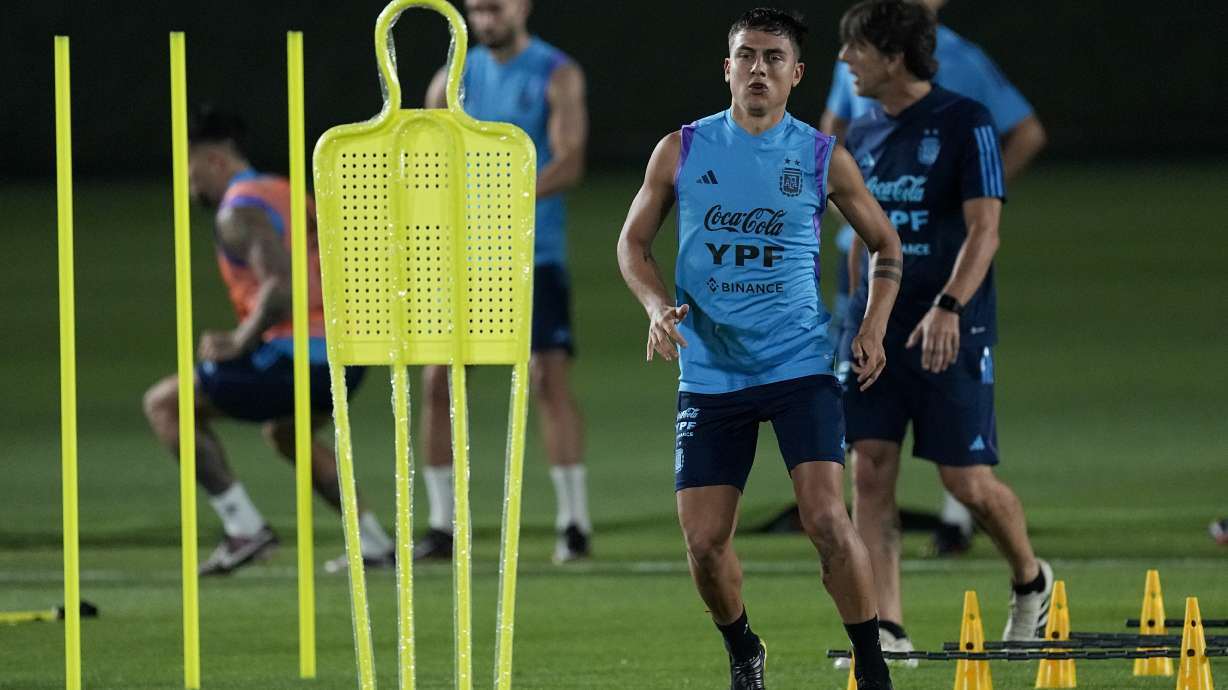 Paulo Dybala runs during a training session of Argentina's national soccer team in Doha, Saturday, Nov. 19, 2022.