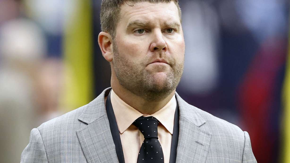 FILE - Tennessee Titans general manager Jon Robinson looks on during warmups before an NFL football game against the Houston Texans, Oct. 30, 2022, in Houston. Tennessee owner Amy Adams Strunk fired general manager Jon Robinson in the midst of his seventh season with the Titans off to a 7-5 start. The Titans announced Strunk's decision in a statement released Tuesday, Dec. 6.