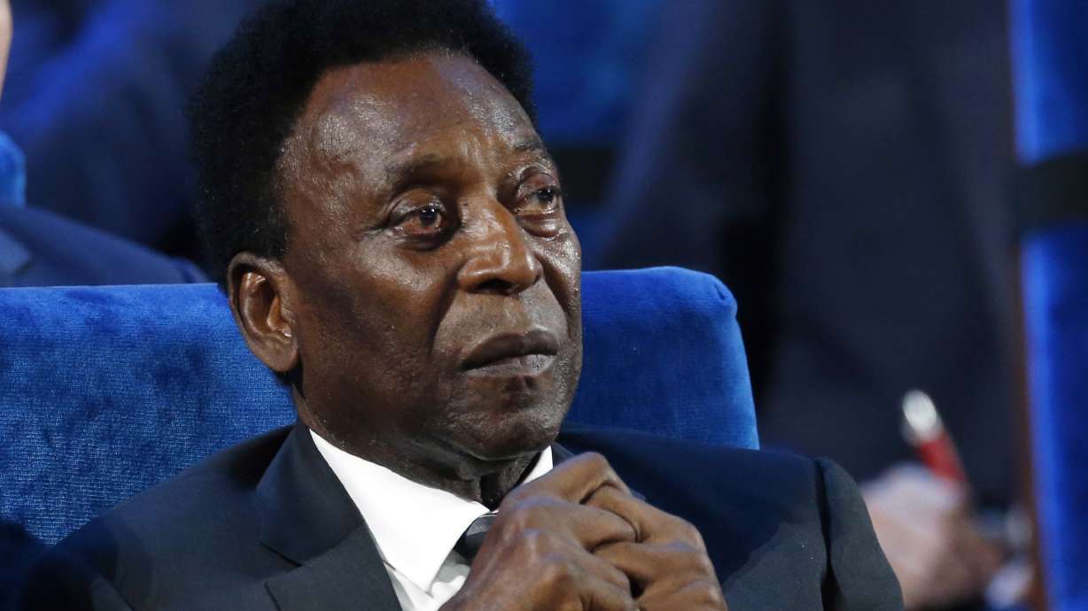 FILE - Brazilian Pele attends the 2018 soccer World Cup draw at the Kremlin in Moscow, Dec. 1, 2017. Brazilian soccer great Pelé was hospitalized in Sao Paulo to regulate the medication in his fight against a colon tumor, his daughter said on Wednesday, Nov. 30, 2022. Kely Nascimento added that there was “no emergency” concerning her 82-year-old father's health.