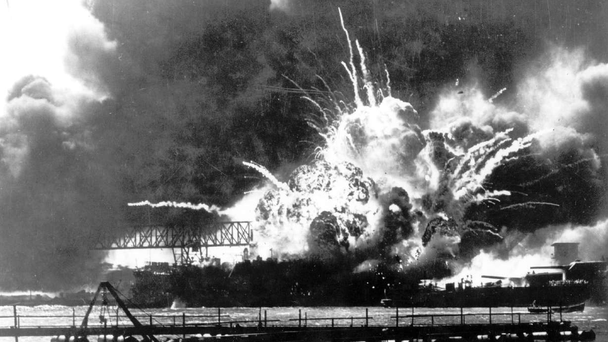 The destroyer USS Shaw explodes after being hit by bombs during the Japanese surprise attack on Pearl Harbor, Hawaii, Dec. 7, 1941. A few centenarian survivors of the attack on Pearl Harbor are expected to gather at the scene of the Japanese bombing on Wednesday to remember those who perished 81 years ago.
