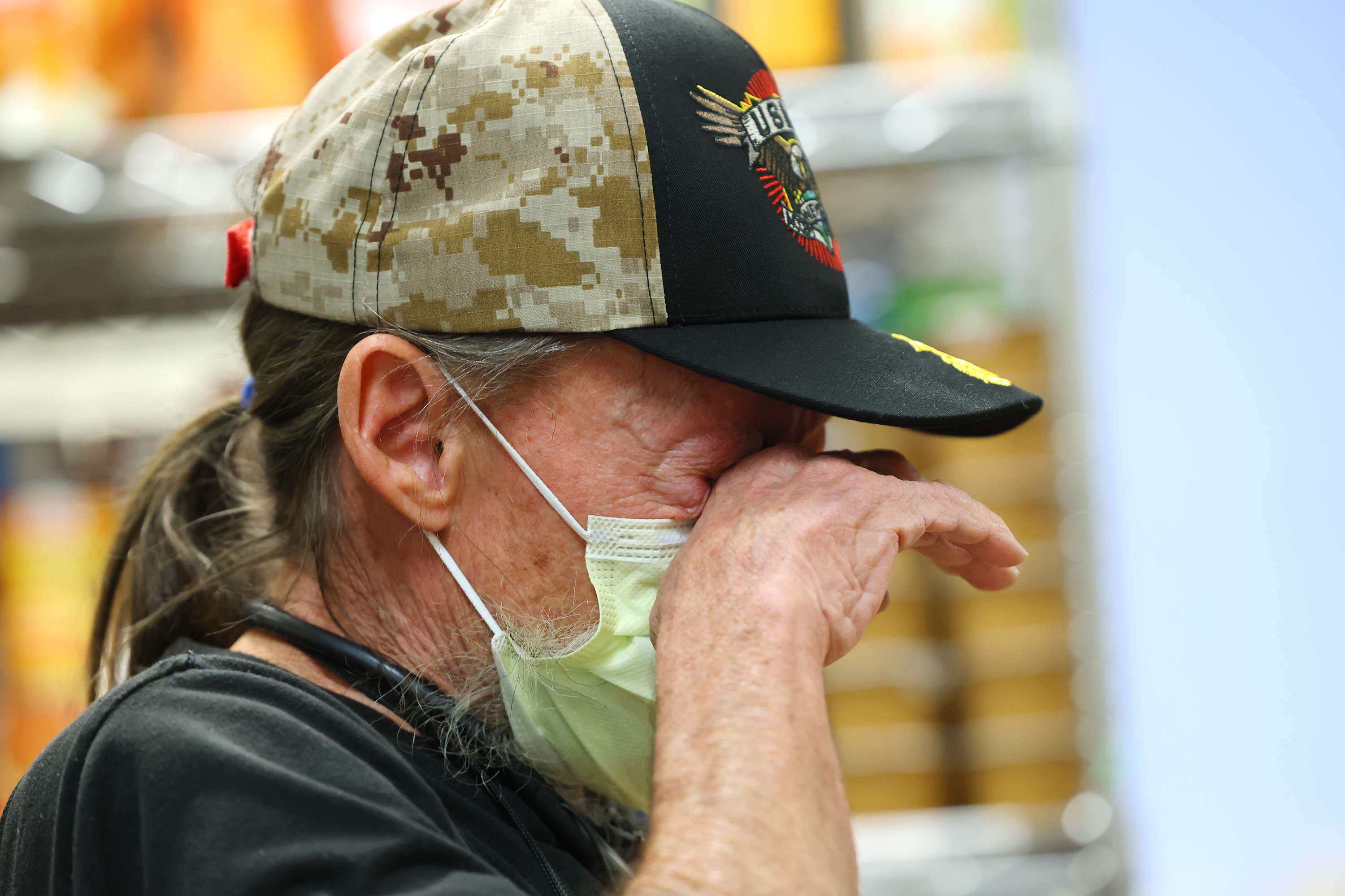 Rex Randall, a Marine veteran and pantry worker, becomes emotional as he talks about the pantry and his work to get it ready as the VA Salt Lake City Health Care System opened its new food pantry in Building 5 at the George E. Wahlen VA Medical Center in Salt Lake City on Wednesday.