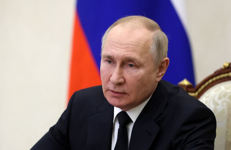 Russian President Vladimir Putin chairs a meeting with members of the Security Council via a video link in Moscow, Russia Tuesday. Putin has acknowledged that his army could be fighting in Ukraine for a long time but said for now there will be no second call-up of soldiers.