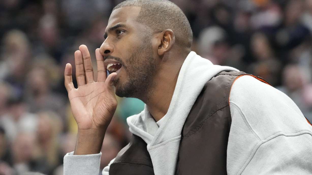 Phoenix Suns guard Chris Paul shouts to his teammates during the first half of an NBA basketball game against the Utah Jazz, Friday, Nov. 18, 2022, in Salt Lake City.