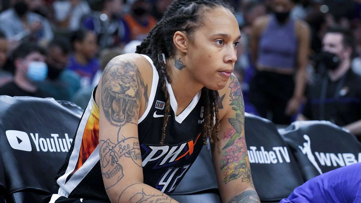 FILE - Phoenix Mercury center Brittney Griner sits during the first half of Game 2 of basketball's WNBA Finals against the Chicago Sky, Wednesday, Oct. 13, 2021, in Phoenix. Russia has freed WNBA star Brittney Griner in a dramatic high-level prisoner exchange, with the U.S. releasing notorious Russian arms dealer Viktor Bout.