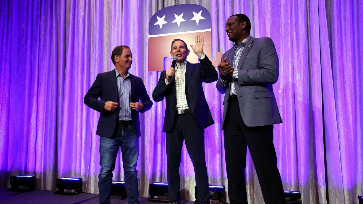 Utah GOP Reps. John Curtis, left, Chris Stewart and Burgess Owens in Salt Lake City on Nov. 8. The House passed the amended version of the Respect for Marriage Act on Thursday with three of Utah's four Republican congressmen voting in favor.